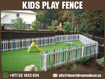 kids play wooden fences in uae